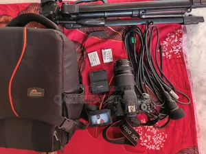 Full camera setup with Canon 700D 75-300mm Zoom Lens for sale.