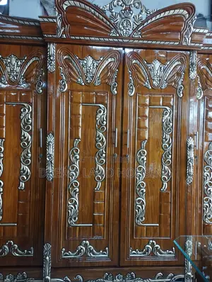 Get a royal Padma design 4-door Chittagong teak wood wardrobe