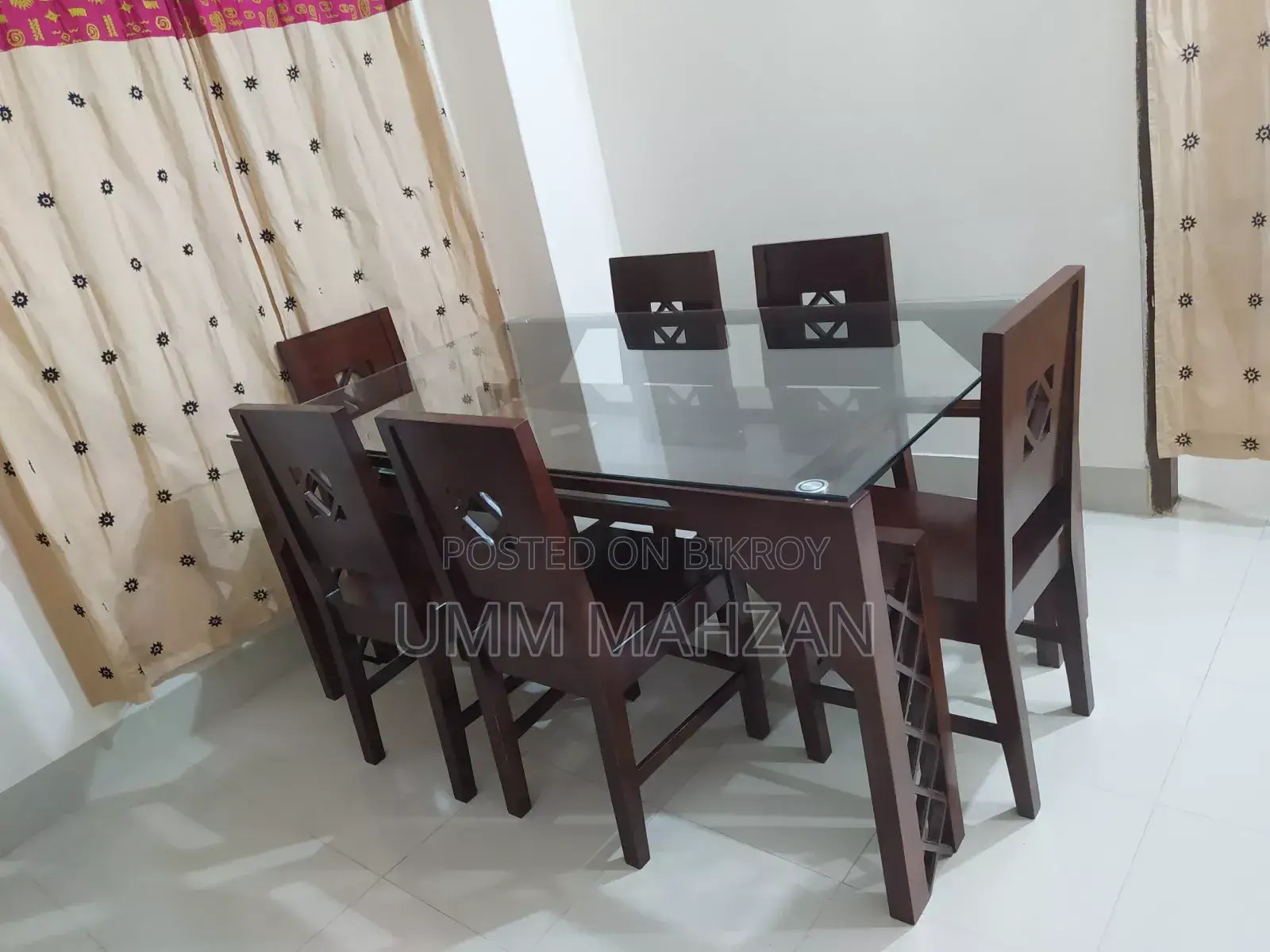 This Canadian and Mahogany wood dining table is for sale.
