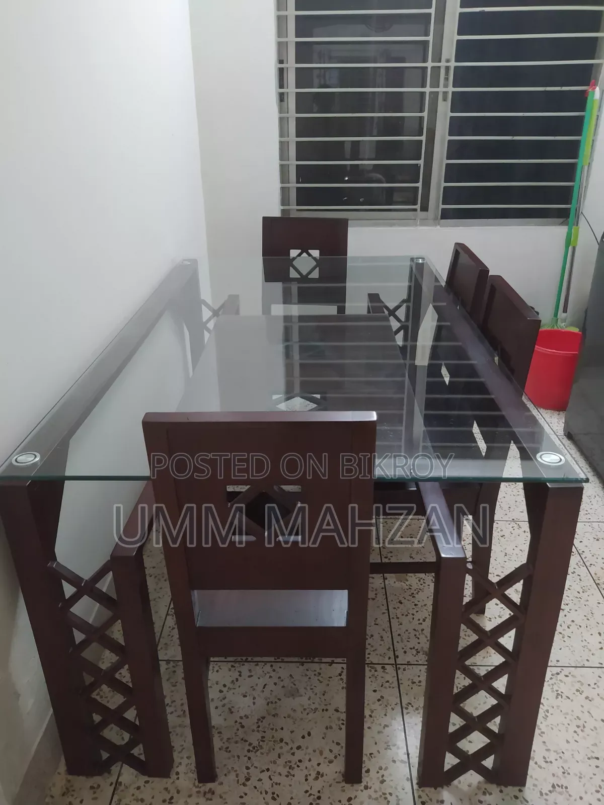 This Canadian and Mahogany wood dining table is for sale.