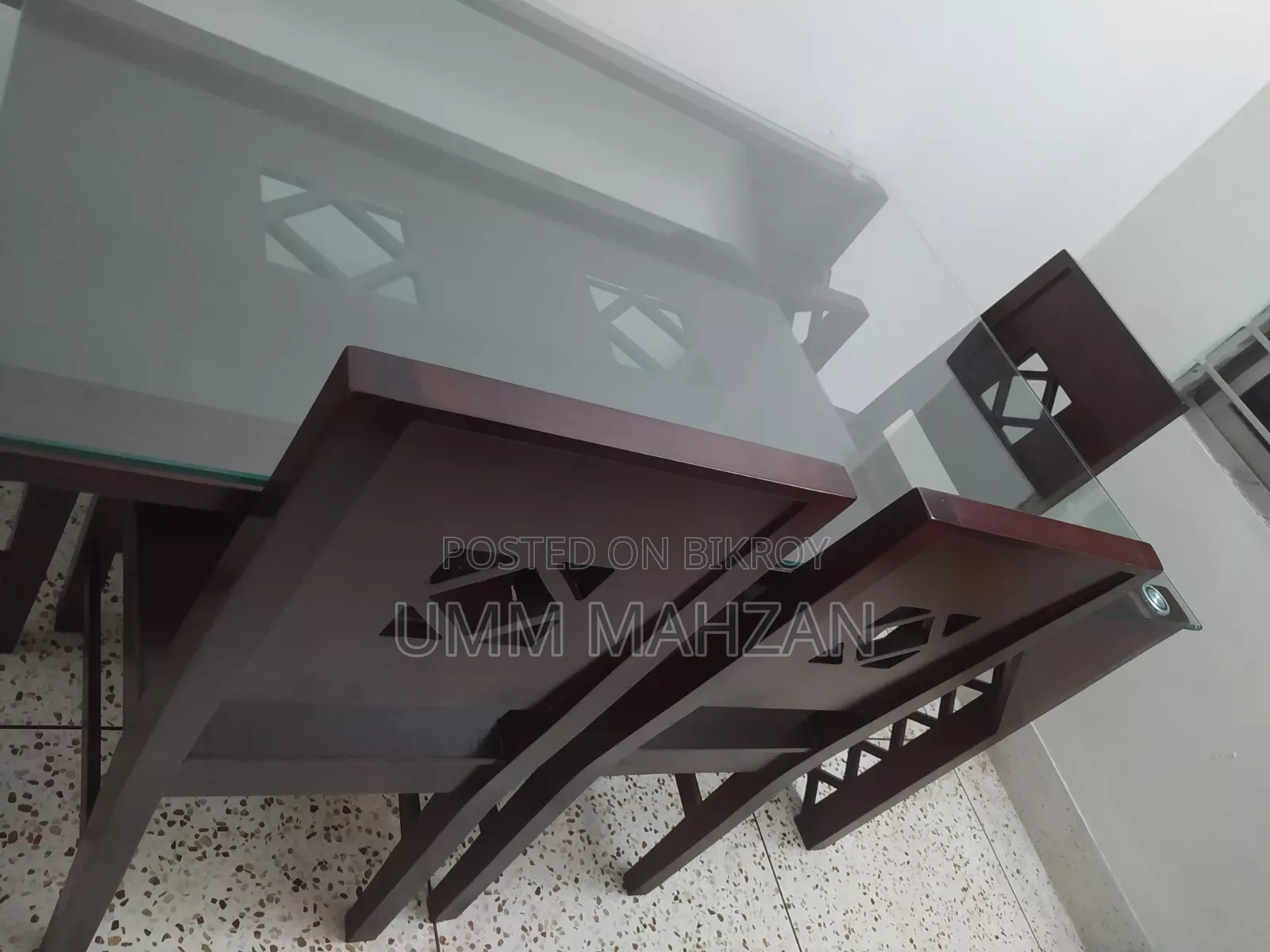 This Canadian and Mahogany wood dining table is for sale.