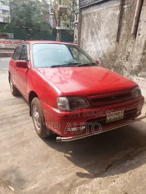 টয়োটা স্টারলেট গ্লানজা ১৯৯৫ লাল