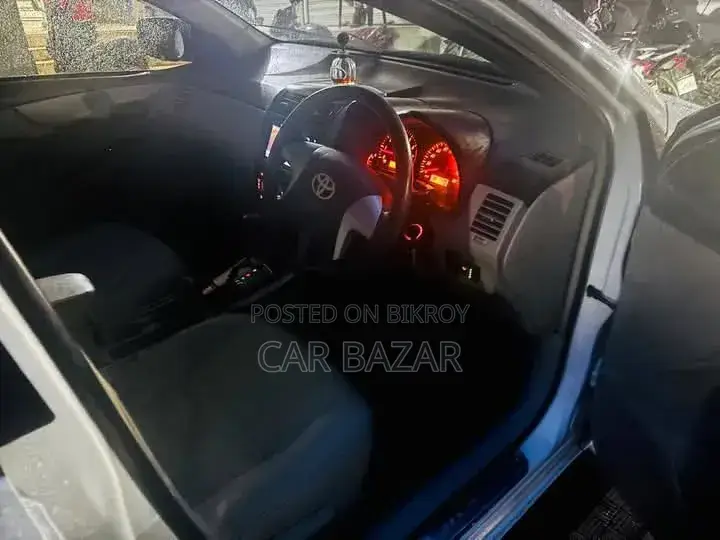টয়োটা অ্যাক্সিও ২০০৮ সাদা