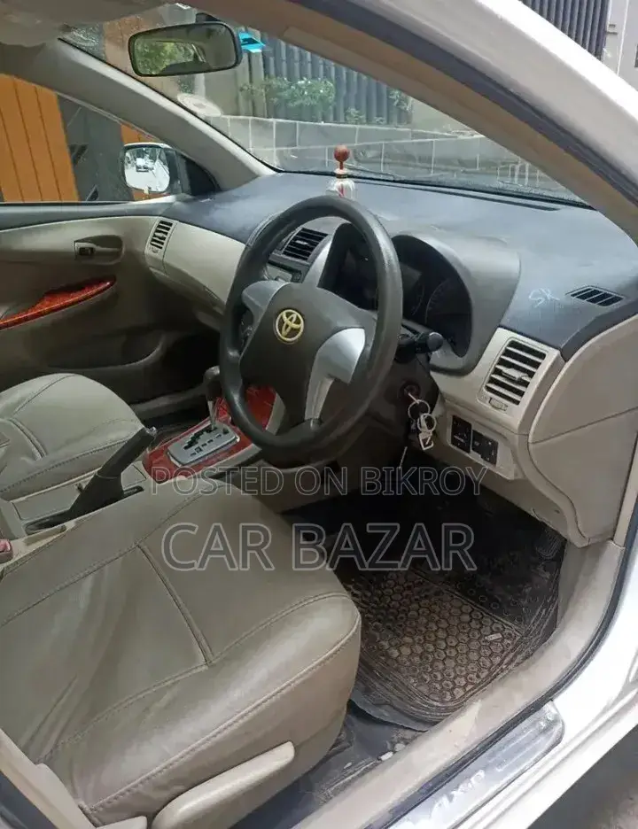 টয়োটা অ্যাক্সিও ২০০৮ সাদা