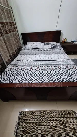 Queen Size Bed made of Malaysian Wood