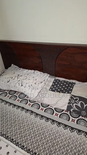 Queen Size Bed made of Malaysian Wood