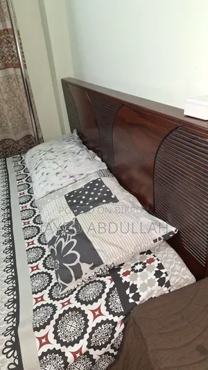 Queen Size Bed made of Malaysian Wood