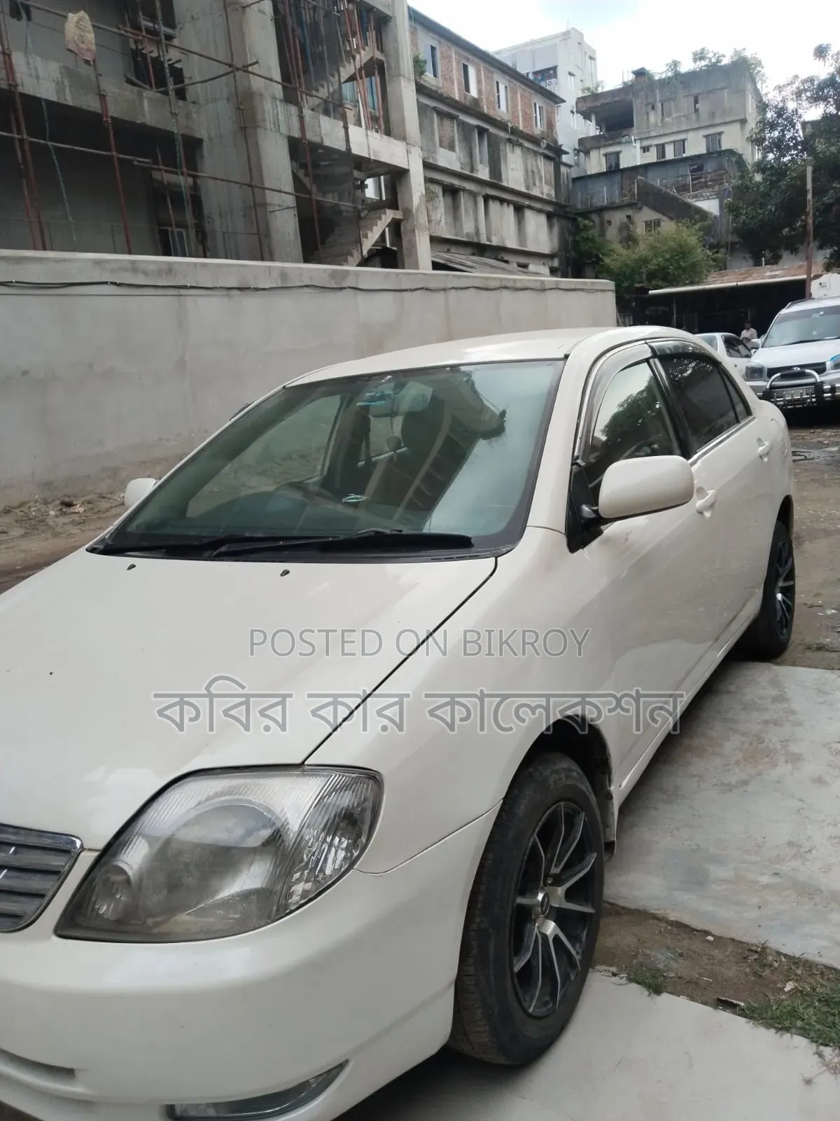 টয়োটা করোলা ২০০২ সাদা