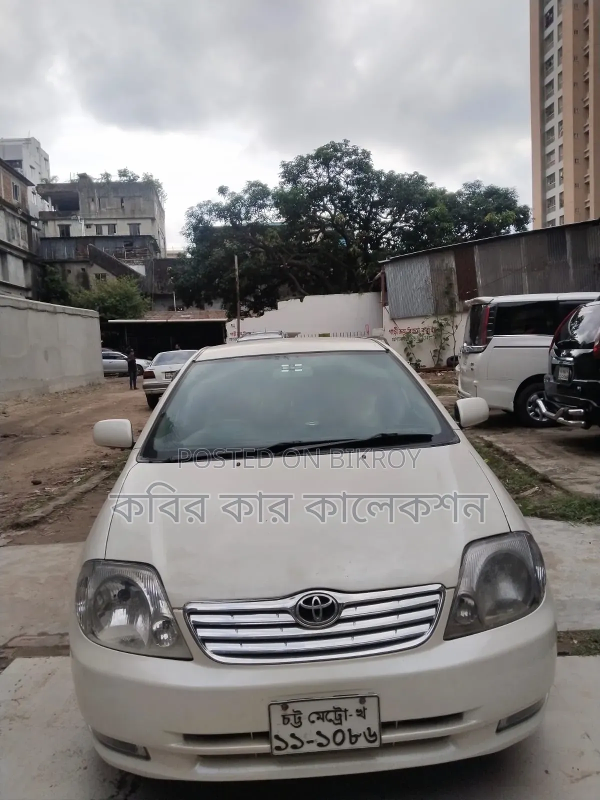 টয়োটা করোলা ২০০২ সাদা