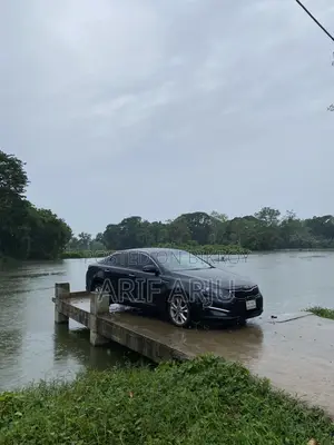 কিয়া অপটিমা ২০১২ কালো