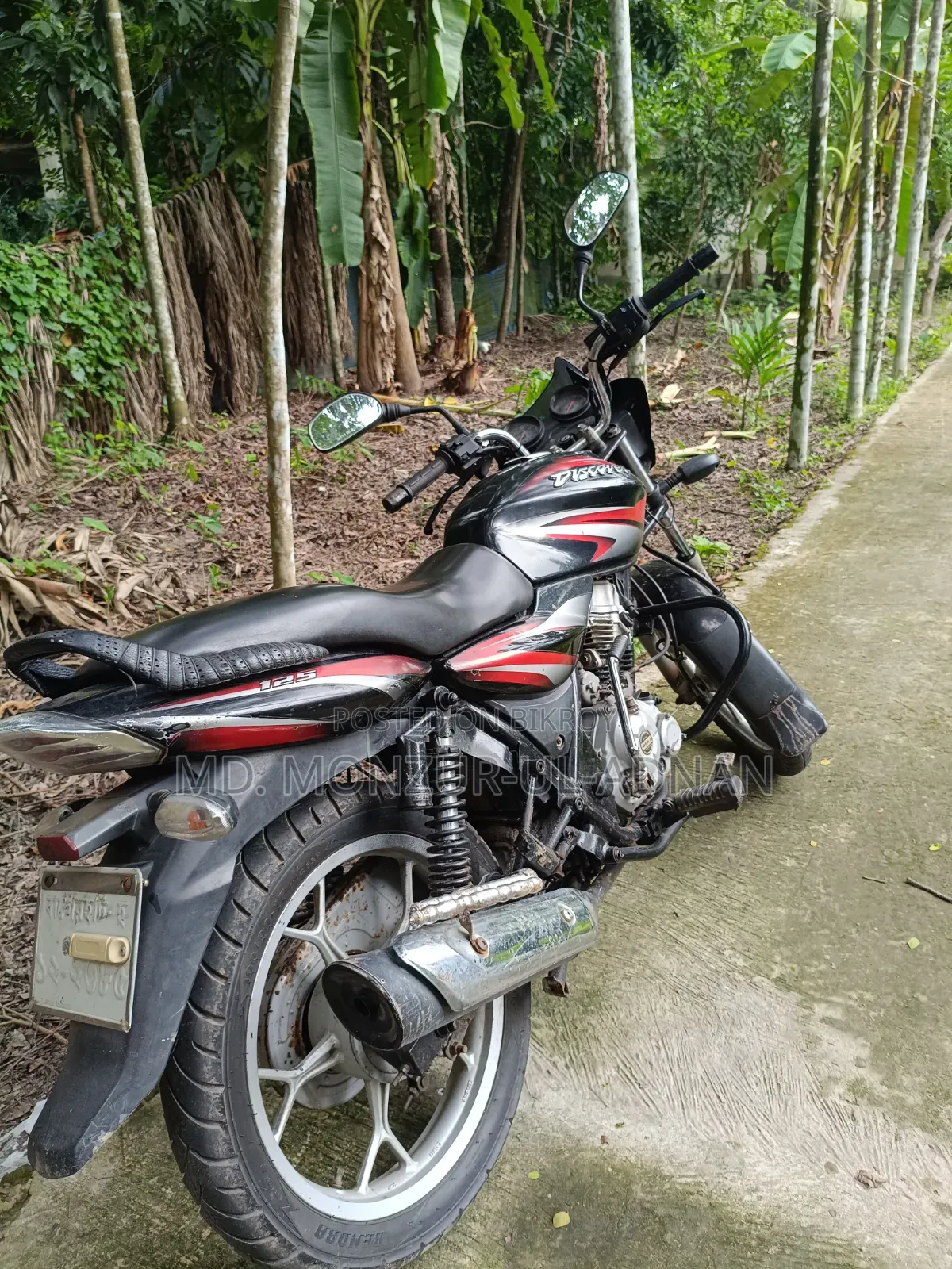 বাজাজ ডিসকভার ১২৫ ২০১২ রেড