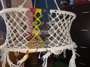 রঙিন পাটের বেবি ক্রেডল