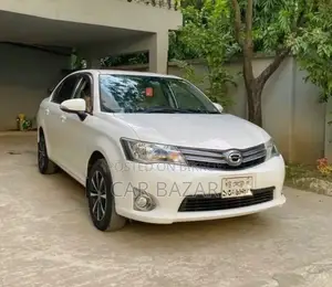 টয়োটা এক্সিও ২০১২ সাদা