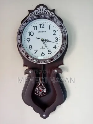 Elegant Wooden Pendulum Wall Clock With Accurate Quartz Movement.
