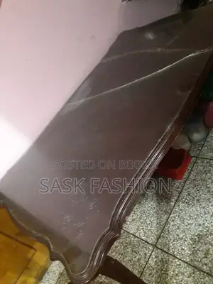 Malaysian board, dining table only, glass is broken.