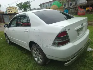 টয়োটা করোলা ১.৫ সেডান ২০০২ পার্ল