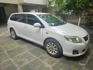 টয়োটা এক্সিও ২০০৯ সাদা
