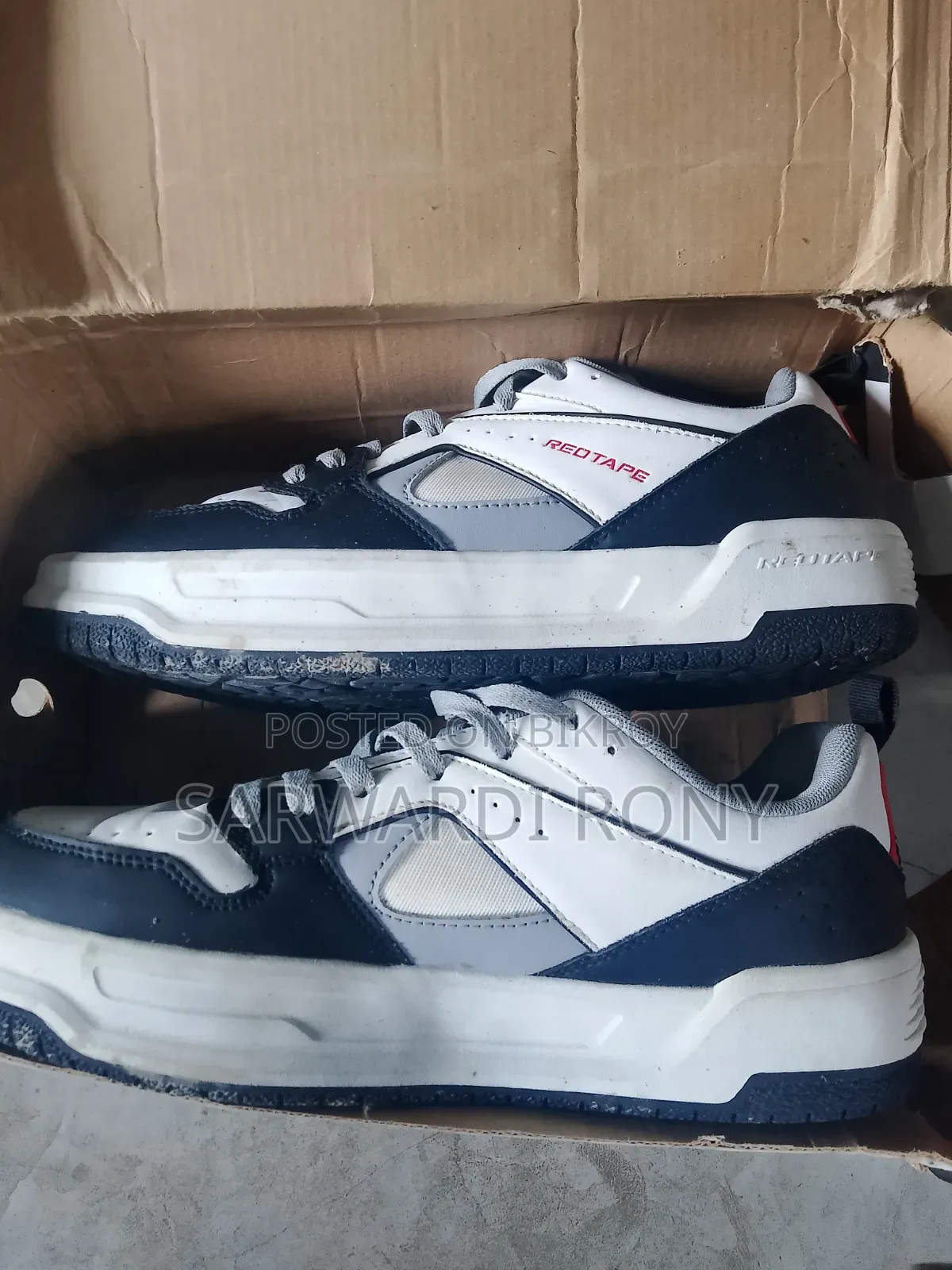 Red Tape Shoe Looks New.
