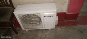 AC is running, includes indoor unit, outdoor unit, display, remote, and pipes