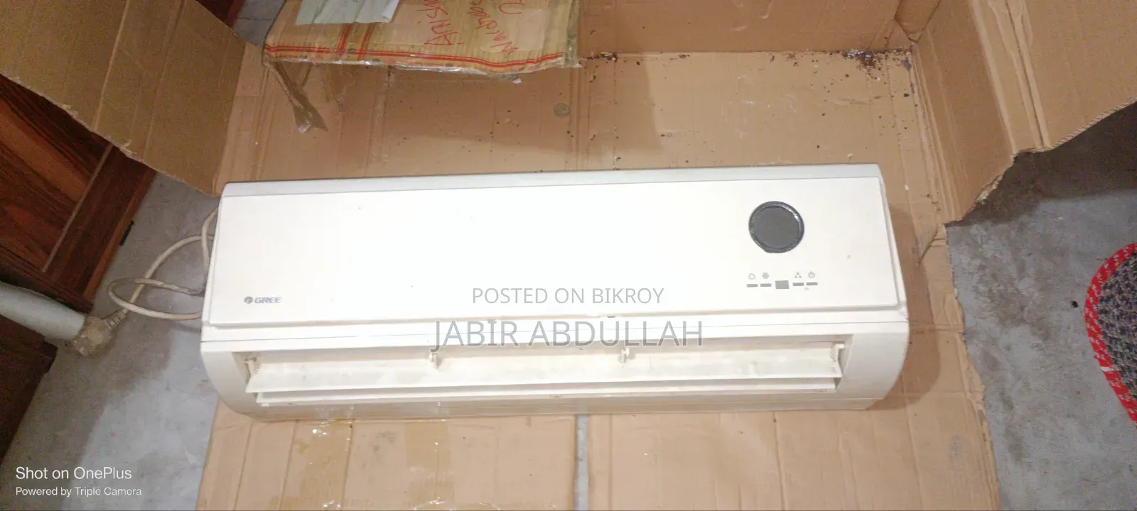 AC is running, includes indoor unit, outdoor unit, display, remote, and pipes