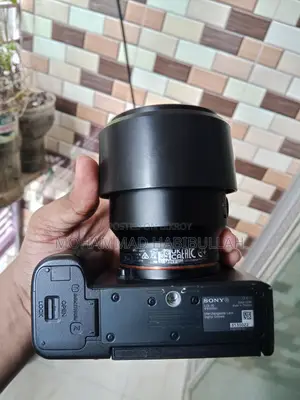Sony A7c and Sony 85mm Lens With Box and Paper