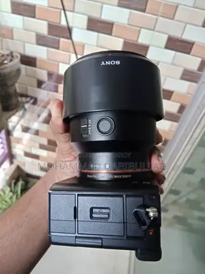Sony A7c and Sony 85mm Lens With Box and Paper