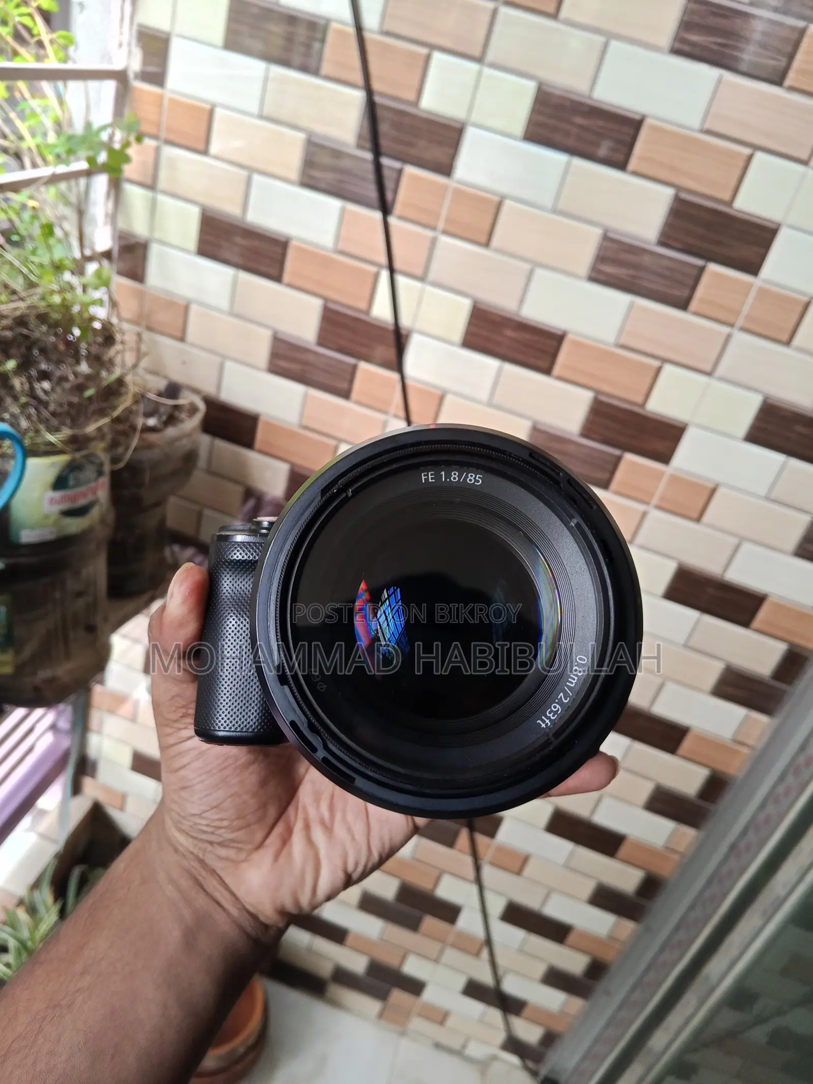 Sony A7c and Sony 85mm Lens With Box and Paper