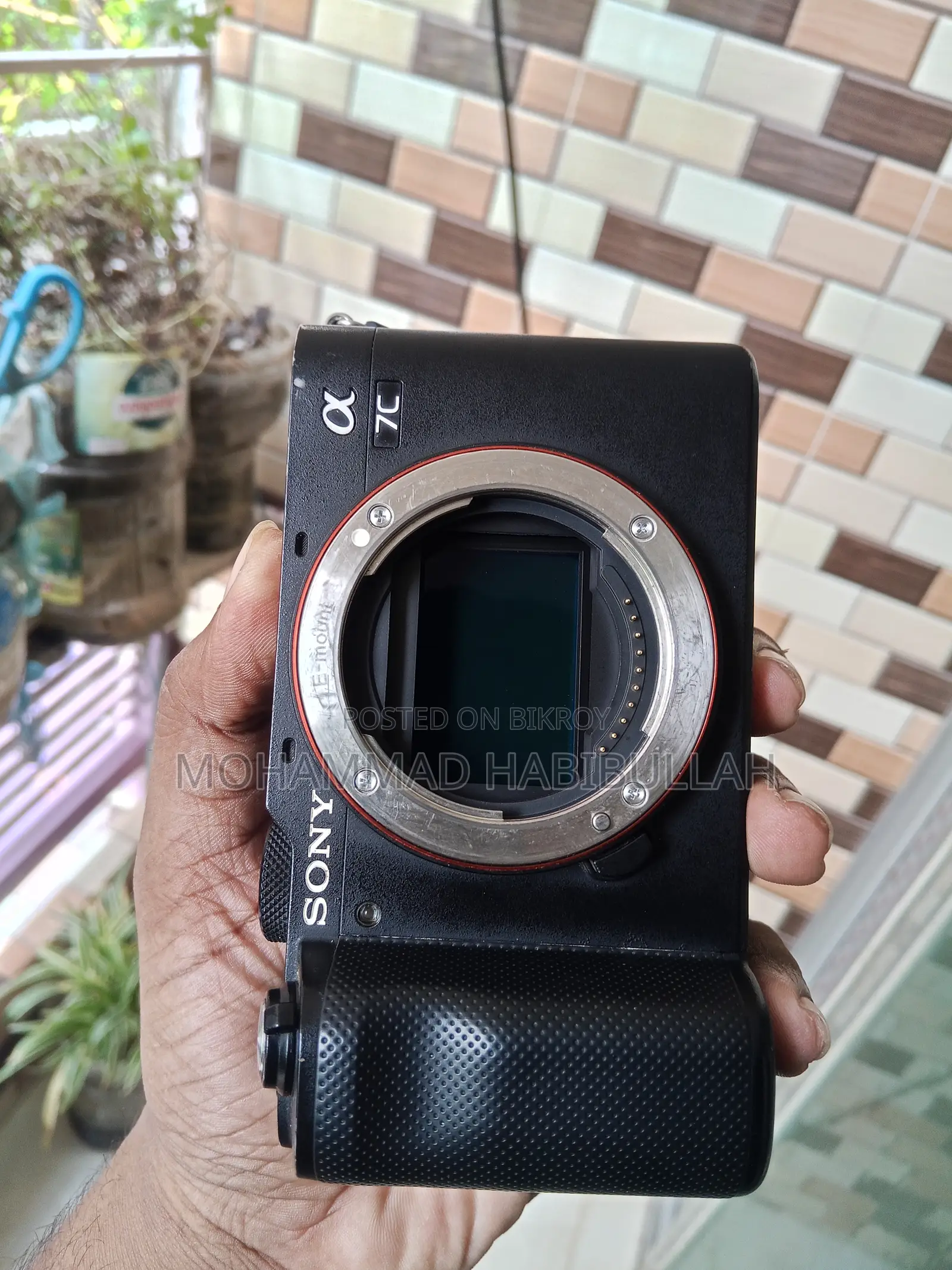 Sony A7c and Sony 85mm Lens With Box and Paper