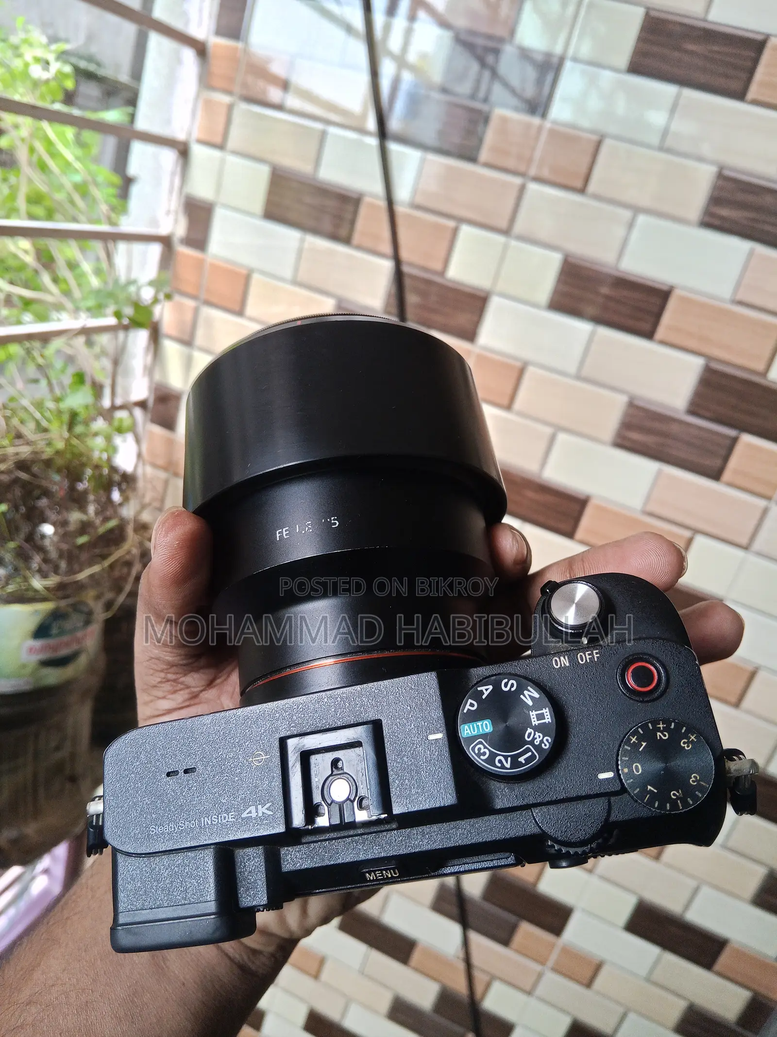 Sony A7c and Sony 85mm Lens With Box and Paper