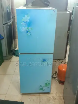 14 CFT running Singer fridge for sale.