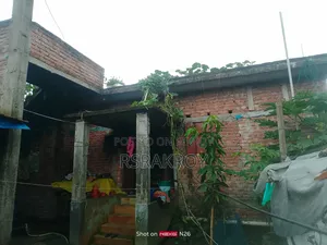 Land with house for urgent sale