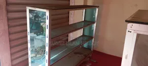 2 Thai Glass Racks or Showcases