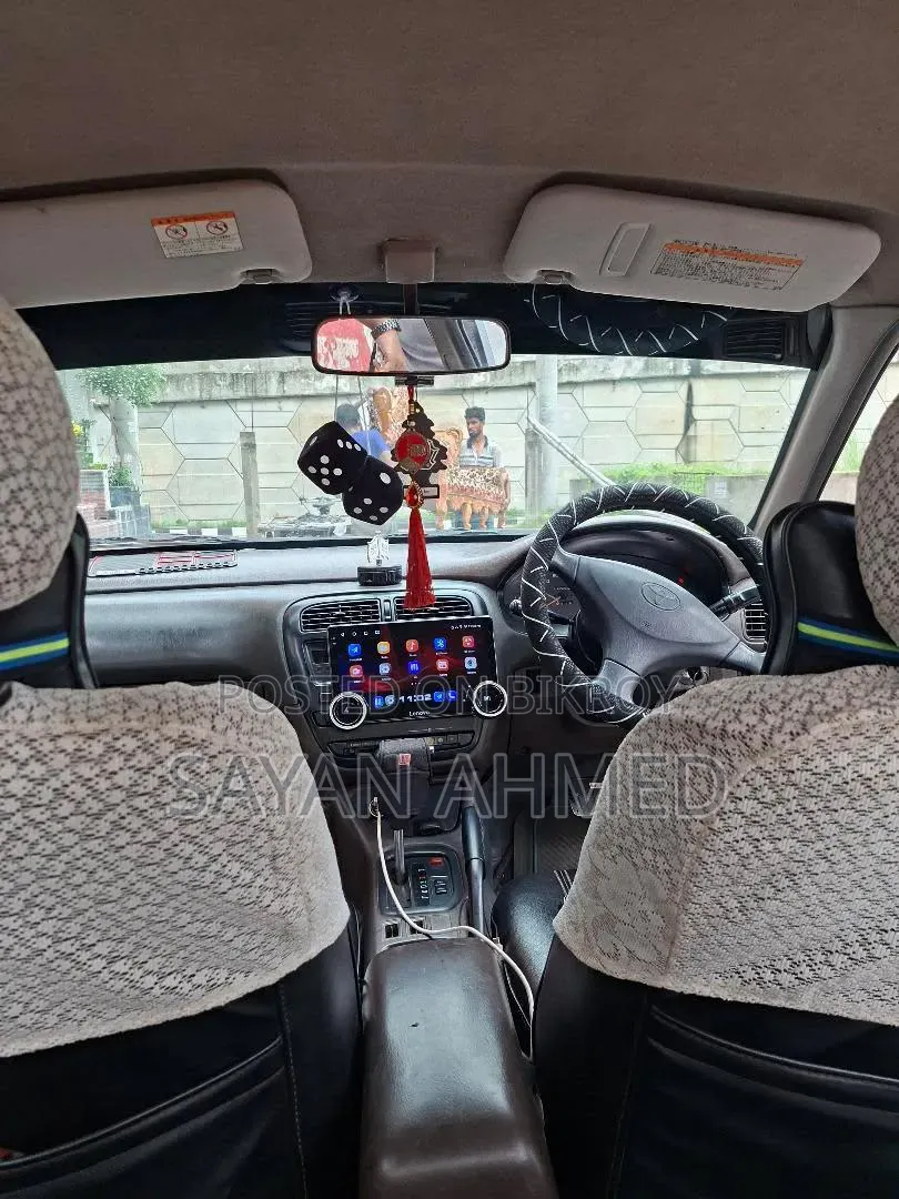 টয়োটা কারিনা ১৯৯৪ সাদা