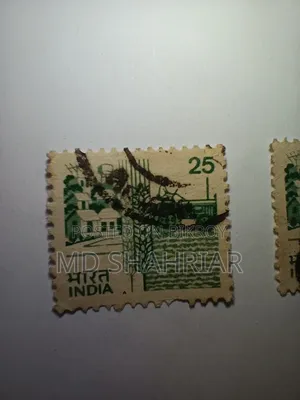 India 25 Paisa Definitive Stamp (1985) – Village Tractor Theme (Used)