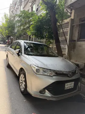 টয়োটা এক্সিও ১.৫ হাইব্রিড ২ডব্লিউডি ২০১৭ সিলভার
