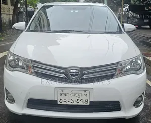 টয়োটা এক্সিও ২০১৩ সাদা