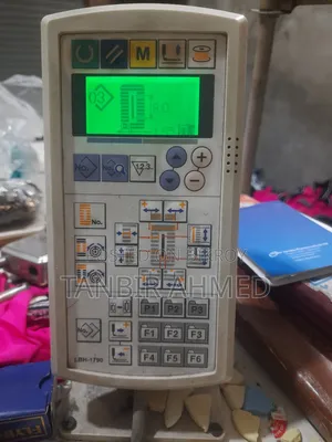 Auto Button Hole Machine