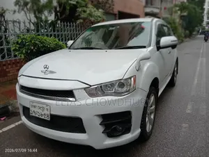 মিতসুবিশি আউটল্যান্ডার স্পোর্ট ইএস ২০১১ পার্ল