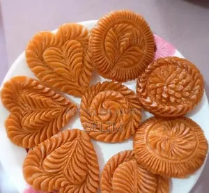 Nakshi Pitha is not just food, it is a piece of rural art carved on pitha
