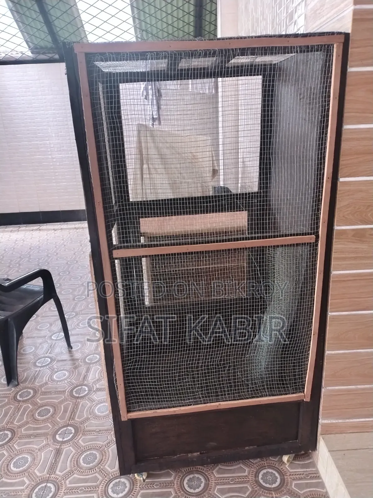 Large bird cage for sale.