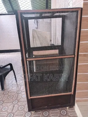 Large bird cage for sale.