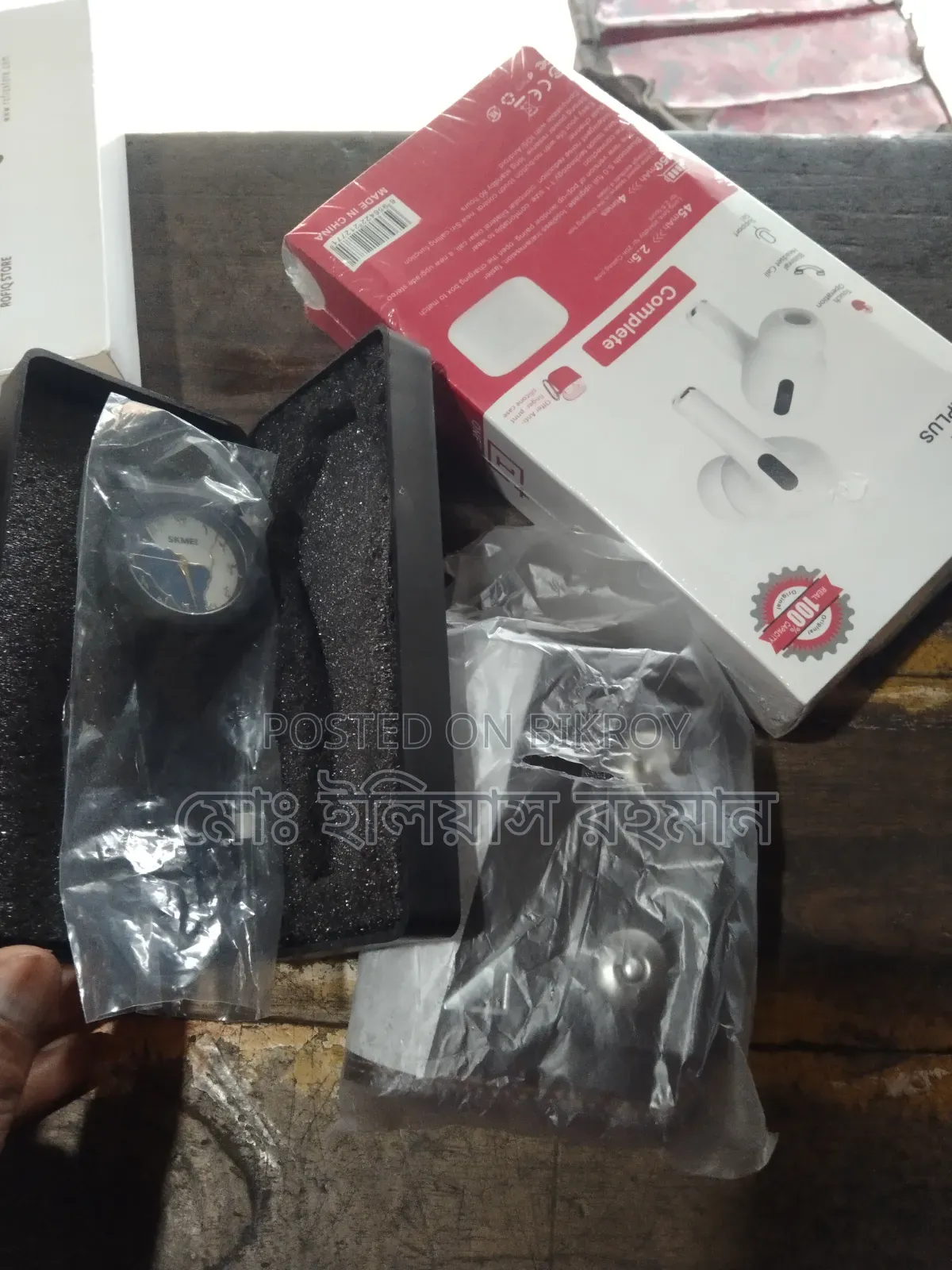 Wallet, Watch, and Earbuds