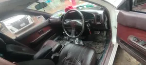 টয়োটা করোলা ১৯৯০ সাদা