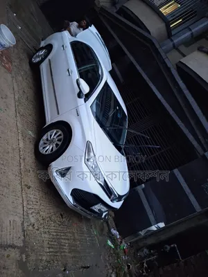 টয়োটা এক্সিও ২০১৮ সাদা