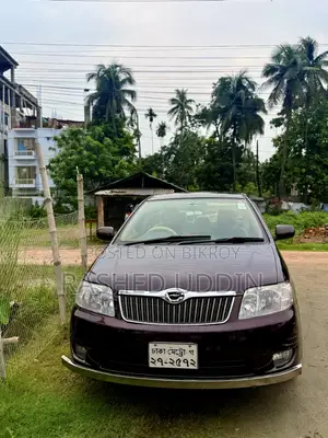 টয়োটা করোলা সেডান অটোমেটিক ২০০৪ বারগান্ডি