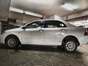 টয়োটা করোলা সেডান ২০০৪ পার্ল