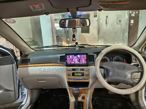 টয়োটা করোলা সেডান ২০০৪ পার্ল