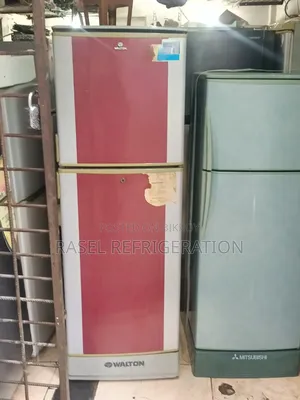 Red 14 Cubic Feet Walton Refrigerator for sale.