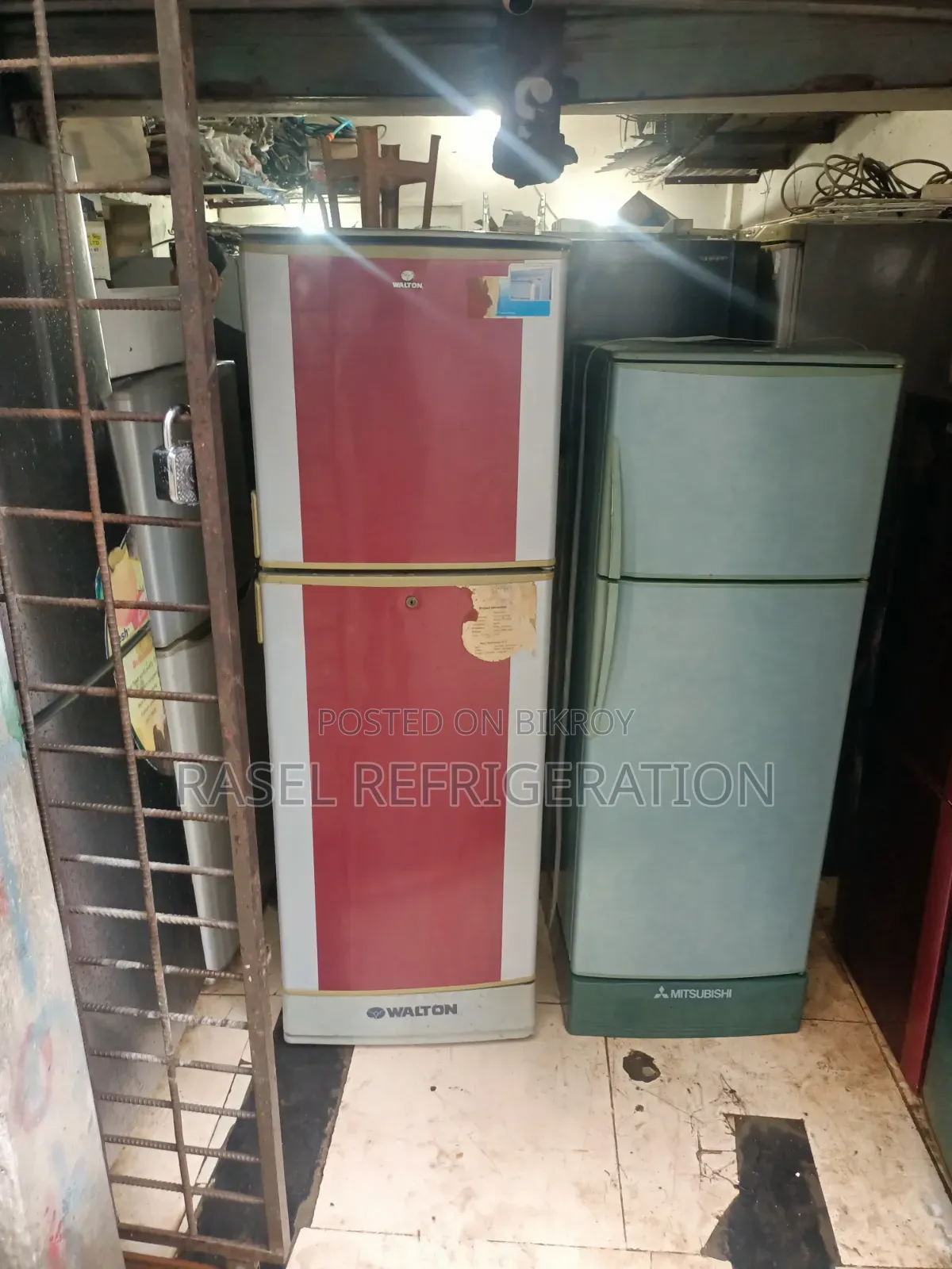Red 14 Cubic Feet Walton Refrigerator for sale.