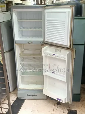 Red 14 Cubic Feet Walton Refrigerator for sale.
